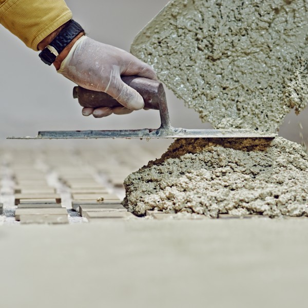 Terrazzo flooring being set by hand