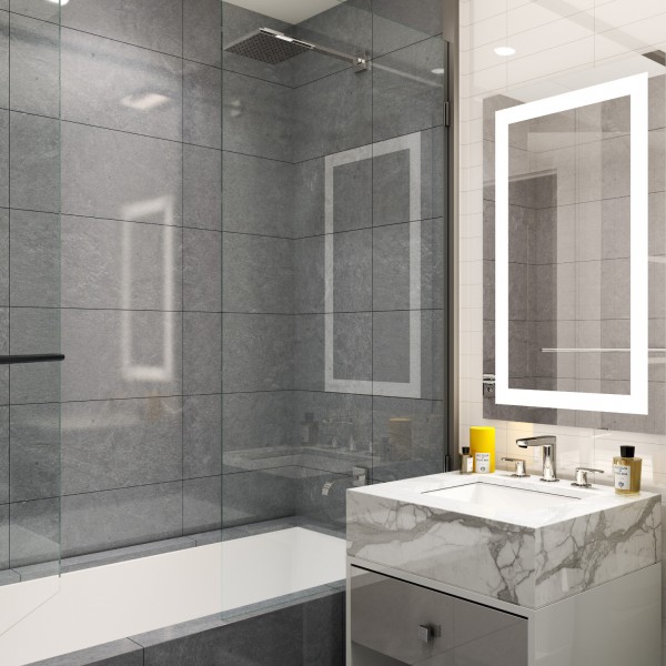 Primary bathroom at The Seymour with marble finishes